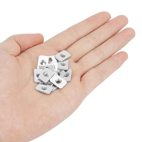 200 Pcs M5 Flat Sliding T Nuts Heavy Duty Carbon Steel Hammer Head T Slots For 2020 Build Rail 3D Printer And CNC Router in hand.