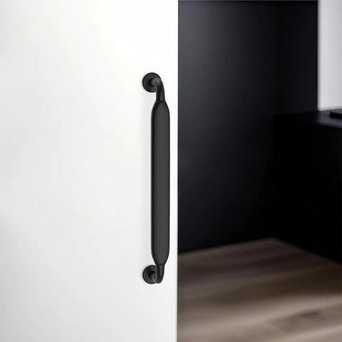 Heavy Duty Zinc Alloy Kitchen Cabinet Pulls, 5 Inch Sleek Matte Black Drawer Handles on a white cabinet door.