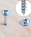 Close-up of Pocket Hole Screws Self Tapping Torx T20 Coarse Thread Wood Screws 1 1 4 Inch 32mm Silver on wood surface