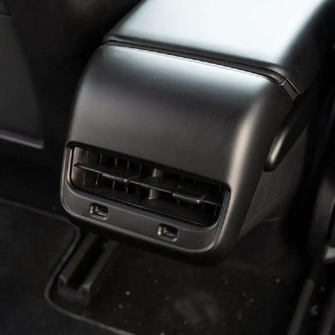 Fresh Matte Black Rear Air Vent Covers Plus Center Console Armrest Wraps For Tesla Model Y And Model 3 close-up view of rear air vent.