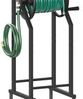 4-Spike Garden Hose Reel With 3.9 Ft Leader Hose And Stainless Fitting, black metal stand holding green hose.