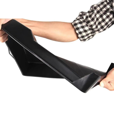 Hand holding a flexible black paint tray for 8Pcs 10 Inch Paint Rollers for Smooth Wall Makeover and Fresh Pattern Textures.