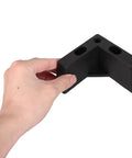 Hand holding Rock Solid Thickened Structure Plastic Furniture Legs L Shaped With M5 Screws Black Four Pack Replacement Feet