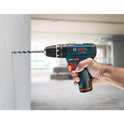 12V Max 3/8 Inch Hammer Drill Driver Bare Tool for Pros being used to drill into concrete wall