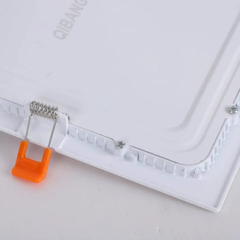 Close-up of 4 Pack 8 Inch Square LED Recessed Lights With Junction Box Dimmable showing installation clip and edge detail.