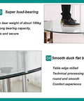 Go-To Heavy-Duty Glass Lazy Susan Turntable for Dining Tables showing foot on sturdy transparent plate and smooth edge