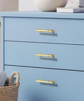 Minimalist Bright Gold Aluminum Alloy Cabinet And Wardrobe Handles Set Six Pack installed on blue drawers with 3.78 inch hole spacing