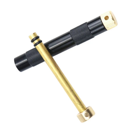 Compact Air Compression Fire Starter with durable metal body, featuring aluminum alloy and brass construction for camping and bushcraft.