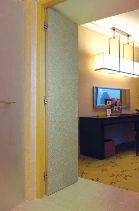 Invisible Hinge Model 216 for Doors 1.375 to 1.75 Inches Thick, Sleek 180 Degree Swing, fully installed in modern interior room.