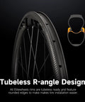 Close-up of Carbon Fiber Road Bike Wheels 38mm Tubeless Ready Clincher Rims 700C showing R-angle design on black background.