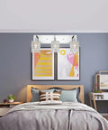Three Light Crystal Vanity Light Fixture With Chrome Finish in bedroom, modern crystal wall sconce above bed with decor