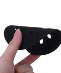 Person holding Pro Grade 5 Inch 8 Hole Hook And Loop Soft Sponge Buffer Pad For Sanding And Polishing, showing 8-hole design
