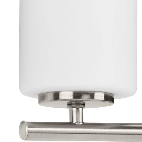 Close-up of Two Light Etched White Glass Modern Bath Vanity Light In Brushed Nickel Finish