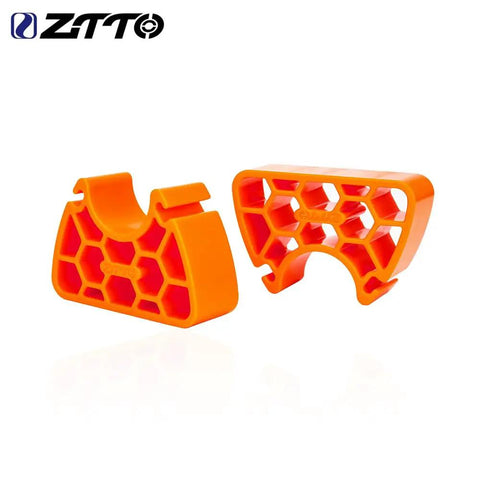 Orange clip 2-pack for Clip On Bike Handlebar Stand Set For Inverted Parking And Bike Maintenance, honeycomb design, secure fit.