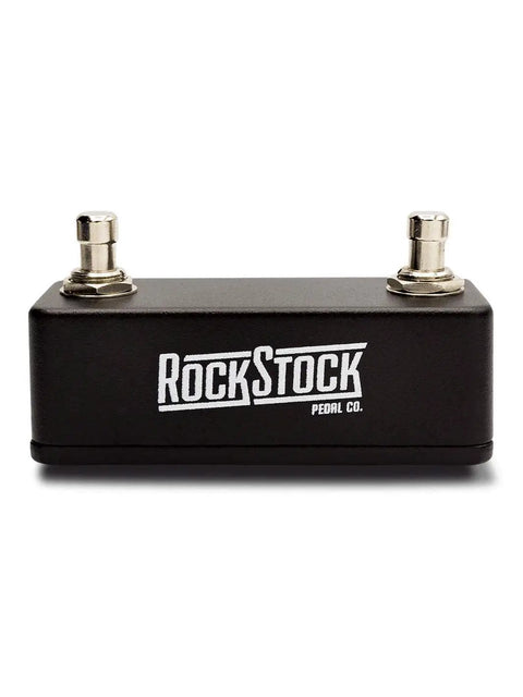 Dual Foot Switch Pedal For Guitar Effects With TRS Expansion To Extend Your Auxiliary Guitar Effects Processor Hand Wired And Built For The Road Matte Black Gig Ready Gear showing front view with logo.