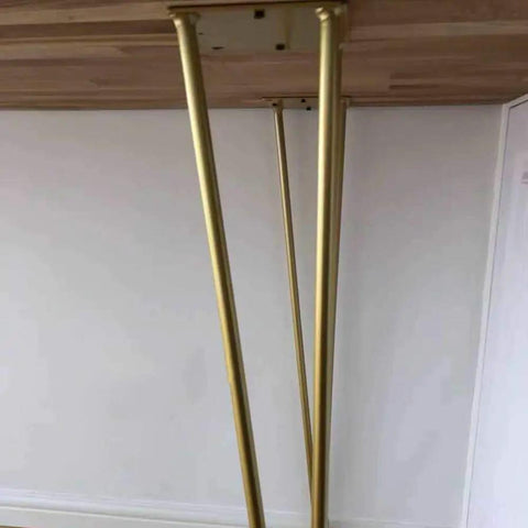 Heavy Duty 28 Inch Gold Hairpin Table Legs With Adjustable Leveling Bolts For Modern Dining And Coffee Tables, underside view.