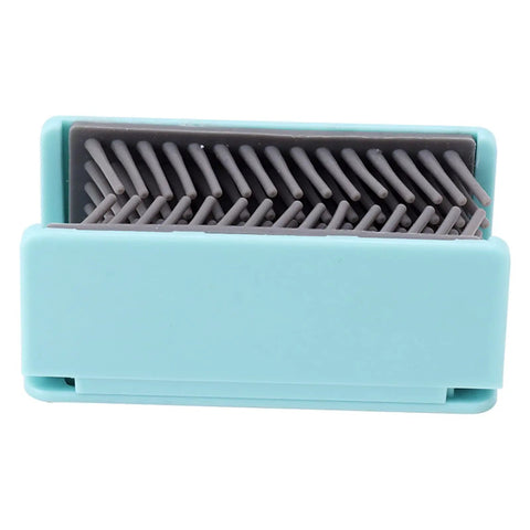 Reusable Silicone Hair Catcher Avoid Clogging Bathtub Drain in blue showing bristles designed to trap hair.