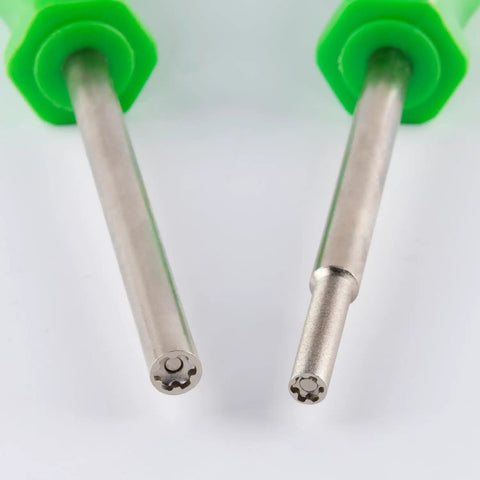 Close-up of 3.8mm and 4.5mm bits with green handle from Gamer's Must Have Security Screwdriver Set for Nintendo, Sega consoles.