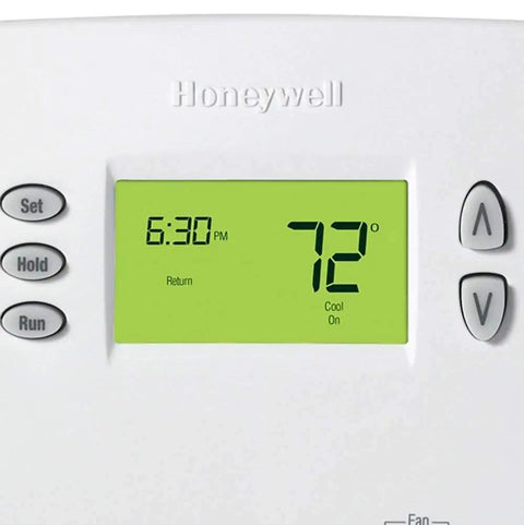 Close-up of Programmable 7 Day Thermostat With 4 Daily Programs, showing green digital display with current temperature set at 72°F.
