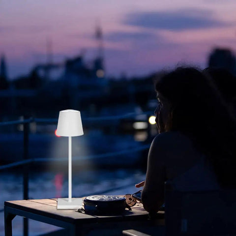 15.4 Inch LED Cordless Table Lamp With 3 Color Dimmable Light on a terrace during evening