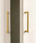 Bead Cabinet Pulls in Brushed Brass With Ball Knobs, Dope Look Gold Kitchen Hardware on white cabinet doors