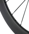 Close-up of Carbon Road Wheelset 700c 38 50 60 88mm Deep Rim Tubeless Ready 25mm Width With Basalt Braking Surface Shimano 8 9 10 11 Compatible