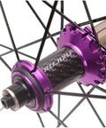 Close-up of carbon cassette hub with purple finish on Road Bike Wheel Set 700C 40mm Double Wall Rims With Carbon Cassette Hub And V Brake 8 To 11