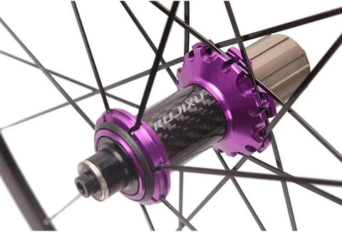Close-up of carbon cassette hub with purple finish on Road Bike Wheel Set 700C 40mm Double Wall Rims With Carbon Cassette Hub And V Brake 8 To 11