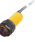 Close-up view of Three Pack E18 D80NK Infrared Photoelectric Switch Obstacle Avoidance Sensor Module with yellow casing and cable connection.