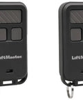 Two black mini key chain garage door opener remotes with grey buttons, compatible with most openers, battery included, easy installation.
