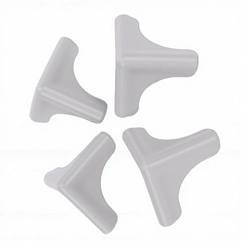 Soft Silicone Corner Protectors With Self Adhesive Edge Covers for tables, desks, and kitchen cabinets in grey, set of four.