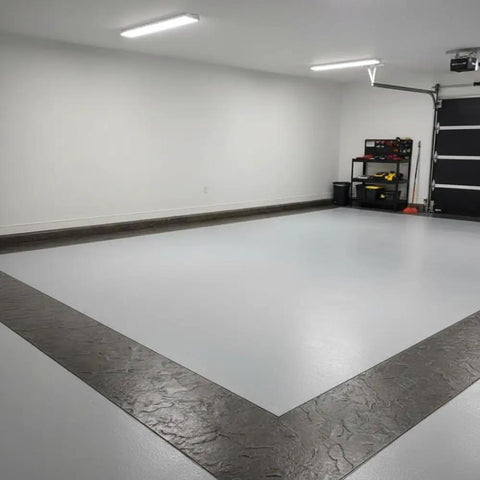 Garage floor with concrete border created using Durable Polyurethane Concrete Texture Roller For DIY And Pro Grade Projects 3 By 3 By 9 Inches Texturing Tool For Walkways Patios And Borders Concrete Stamping Roller Made In USA Long Lasting Imprint.