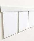 White Magnetic Wall Display Bars For Kid Art And Photos Strong Magnet Gallery Track System Total Flex Spacing Setup showing blank paper. 