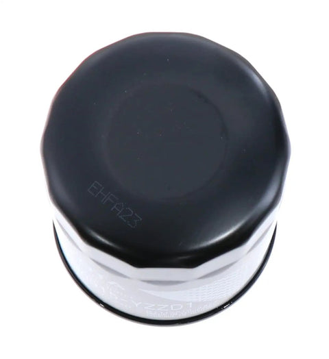 Top view of Toyota Oil Filter Direct Fit OEM Replacement For Toyota Engines, black multi-color housing.