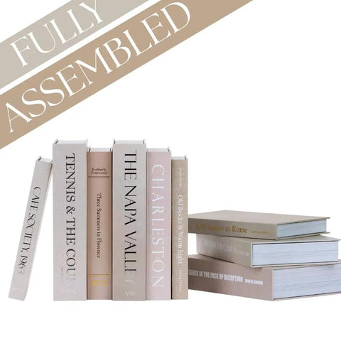 Nine Faux Books With Hidden Storage Set For Modern Shelves And Coffee Tables displayed on white background