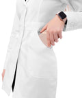 Close-up of Women's Lab Coat 32 Inch Length White With Classic Fit And All Day Comfort Pockets, showing layered pocket details.