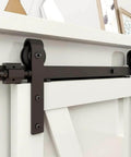 4Ft Sliding Barn Door Hardware Kit For Single Door TV Stands And Small Cabinets With J Shaped Hanger installed on a cabinet.