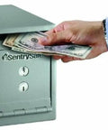 Person inserting cash into Compact Depository Safe With Dual Key Lock For Cash And Receipts, Steel Drop Slot Safe For Offices