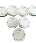 Top view of seven white plastic GM stepper motor end caps labeled X27 168 for repair kit
