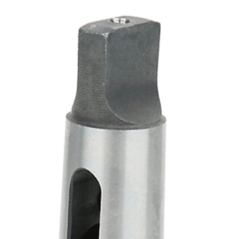 Close-up of drill sleeve adapter MT3-to-MT2 taper, small silver metal body with square male end