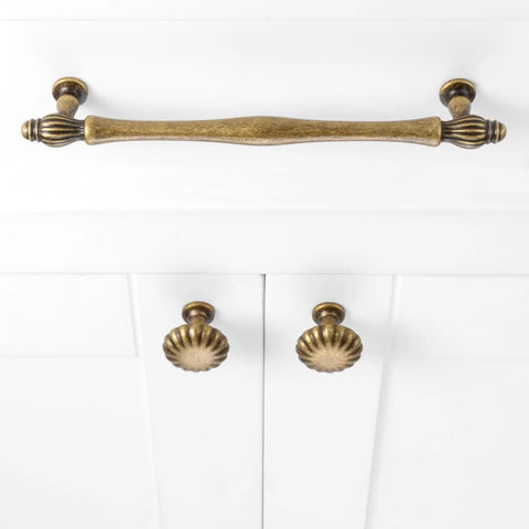 Antique Brass Cabinet Knobs One And A Quarter Inch Ten Pack Single Hole Drawer Pulls on white cabinet doors