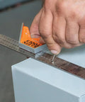 Close-up of 935CSEL Magnetic Combo Square Ruler for Electricians and Carpenters, aluminum tool with bubble level and magnets in use