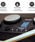 Close-up of Tabletop Electric Drum Set With 4 Velocity-Sensitive Pads, LCD screen displaying settings, and drumsticks.