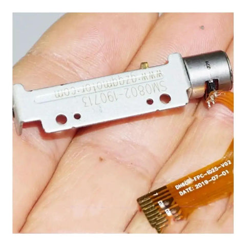 DC 5V 30mm Linear Actuator With 8mm Travel 2-Phase 4-Wire in hand showing size and components.