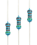 Three blue axial metal-film resistors with color-band markings (through-hole)