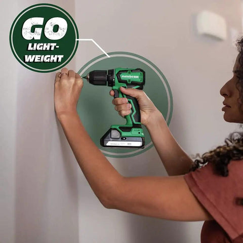 Person using Beast Cordless Drill 18V One Half Inch Subcompact Brushless Driver with lightweight design on wall