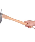 Hand holding Heavy Duty Stainless Steel Pickaxe Hoe With Wooden Handle For Digging In The Garden A Real Workhorse Built To Last