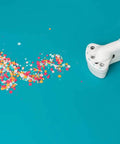 Multi Size Hole Punch For Leather, Paper, Fabric And More Rotates Through Five Hole Sizes with colorful confetti on teal background