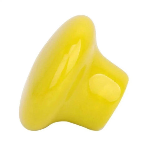 Total Room Glow Up With Durable Yellow Ceramic Round Cabinet Knobs And Easy Grip Handles Perfect For Dressers Kitchens Closets And Cupboards - smooth yellow ceramic knob from a side angle.
