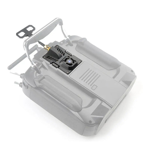 ExpressLRS Micro TX Module 2 to 4G With Cooling Fan and RGB LED plugged into RC remote control